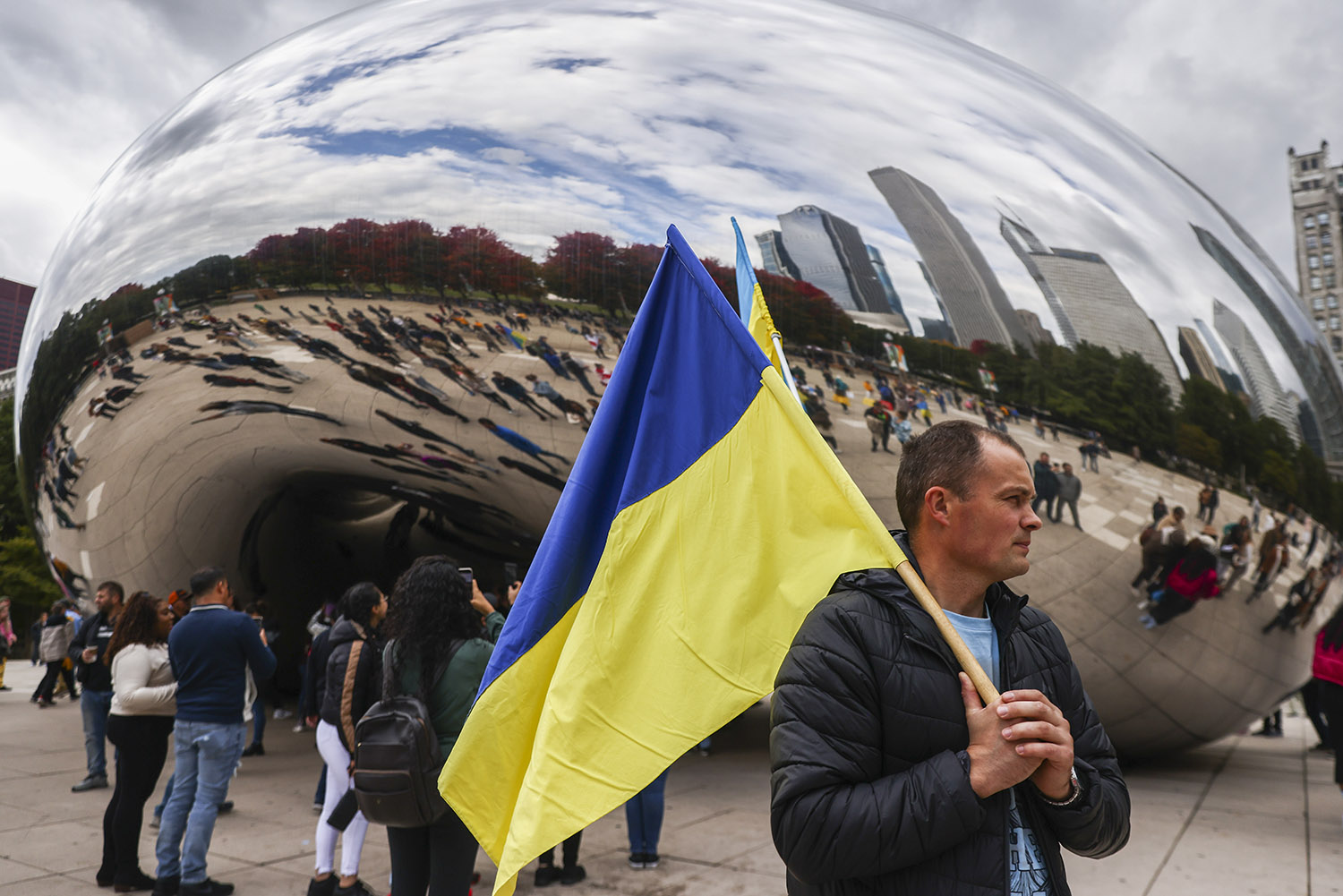 A man holds a Ukrainian flag during a solidarity demonstration in Chicago.