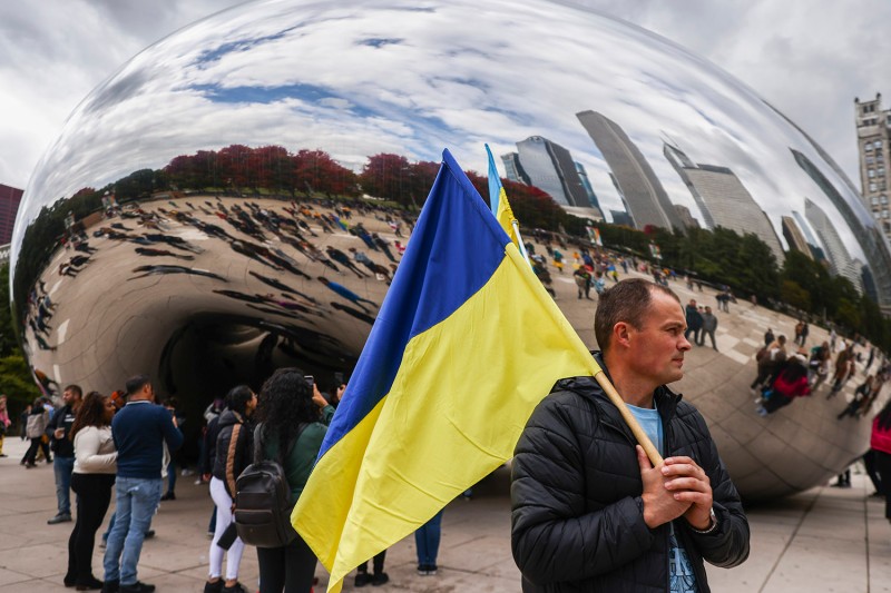 A man holds a Ukrainian flag during a solidarity demonstration in Chicago.