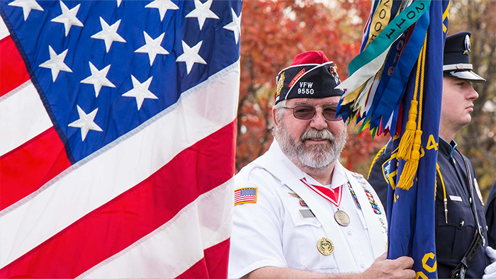 veteran with flag