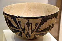 Handmade bowl painted with three standing or dancing figures, c. 4000 BCE. British Museum, London
