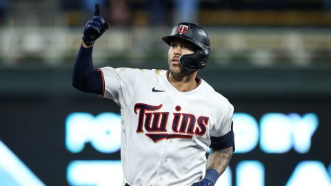 MINNEAPOLIS, MN - SEPTEMBER 09: Carlos Correa #4 of the Minnesota Twins celebrates his two-run home run as he rounds the bases against the Cleveland Guardians in the eighth inning of the game at Target Field on September 9, 2022 in Minneapolis, Minnesota. The Guardians defeated the Twins 7-6. (Photo by David Berding/Getty Images)