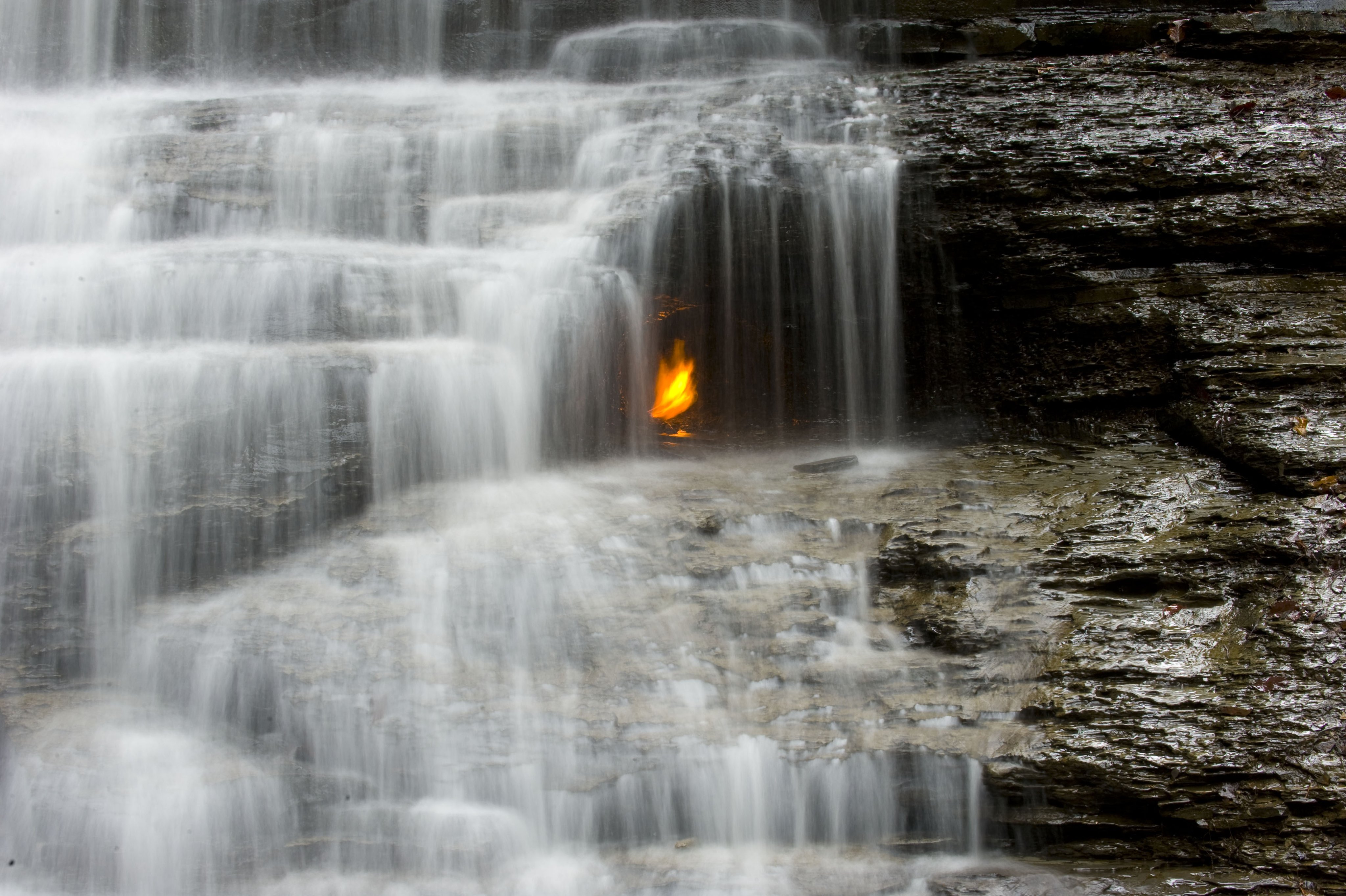 A close-up of the gas-lit flame below Eternal Flame Falls.