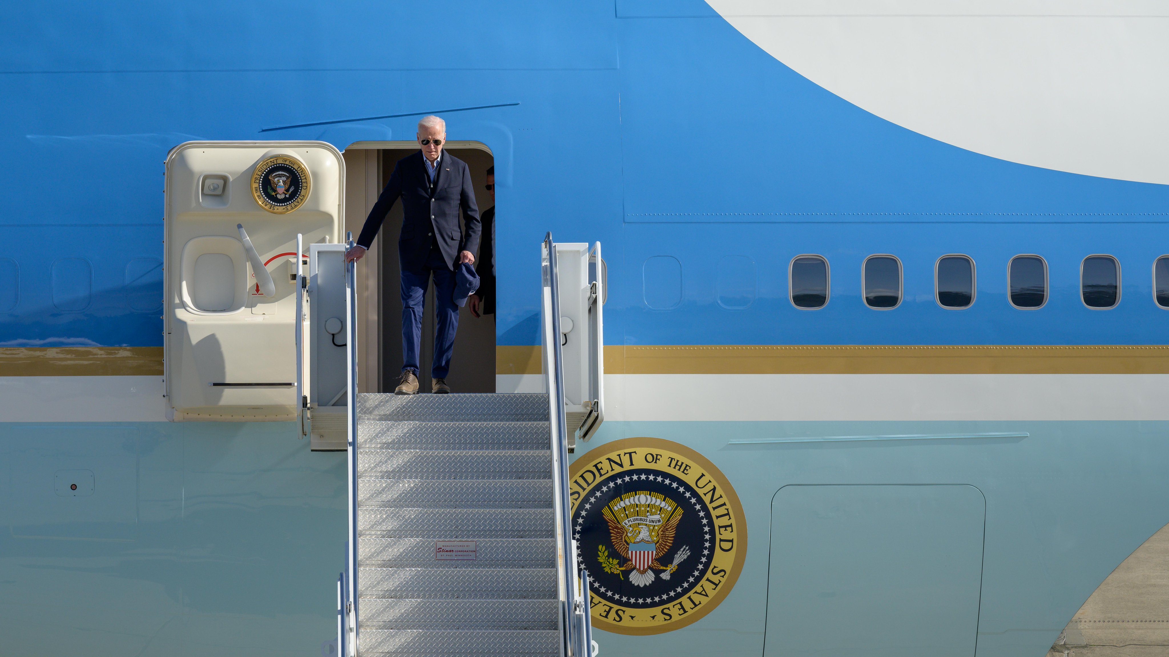 U.S. President Biden exits Air Force One and descends from the top of the stairs at Moffett Federal Airfield, located near NASA's Ames Research Center in Silicon Valley, California. Credit: NASA/ Dominic Hart