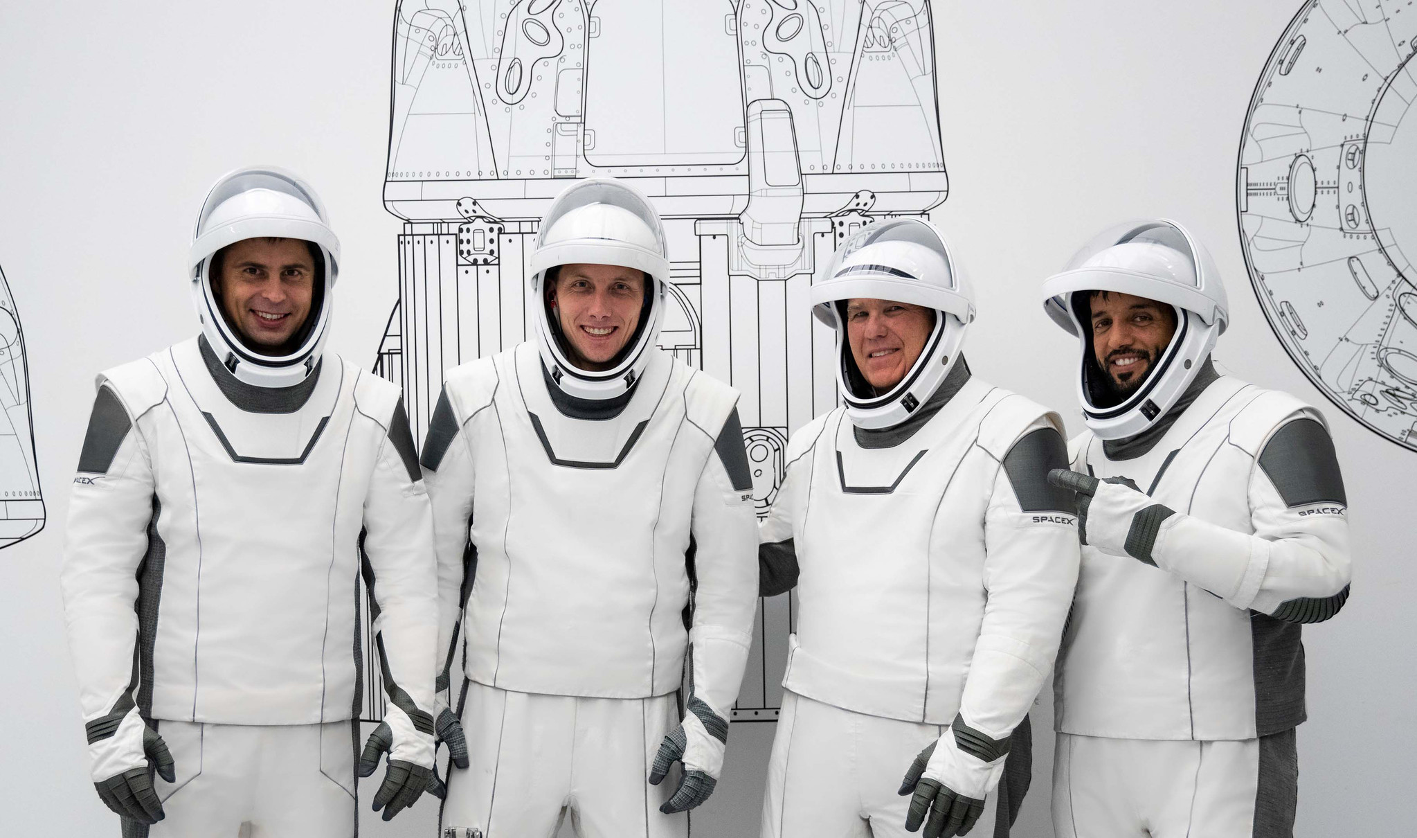 The four crew members that comprise the SpaceX Crew-6 mission pose for a photo in their white spacesuits during a training session at the company's headquarters in Hawthorne, California. From left are, mission specialist Andrey Fedyaev, pilot Warren "Woody" Hoburg, commander Stephen Bowen, and mission specialist Sultan Alneyadi. Credit: SpaceX