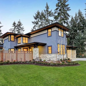 Nice wood fence around modern two-story house