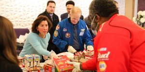 Commerce Secretary Gina Raimondo at the Good Success Church helping distribute food to the community