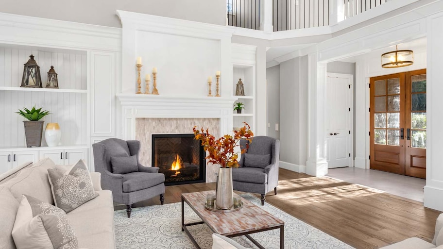 Living room with a traditional fireplace