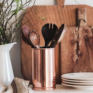 Chopping boards and plates on rustic counter