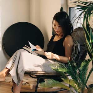 A woman reading at home