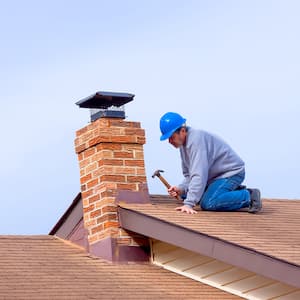 A worker installing new roof