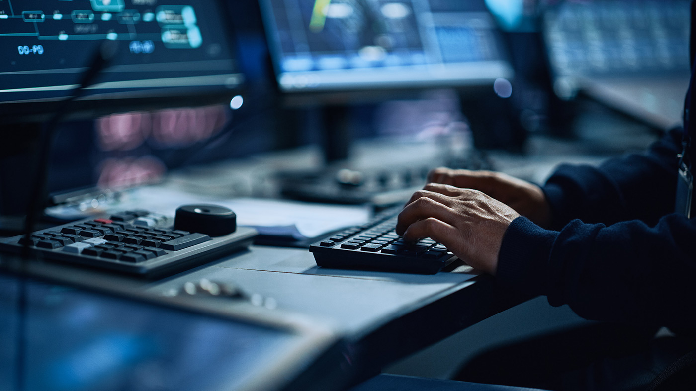 Person typing on computer