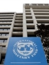 FILE - The International Monetary Fund headquarters building in Washington, U.S., April 8, 2019. 