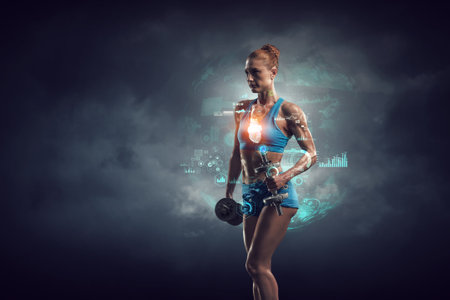 Young beautiful girl doing exercise against dark background