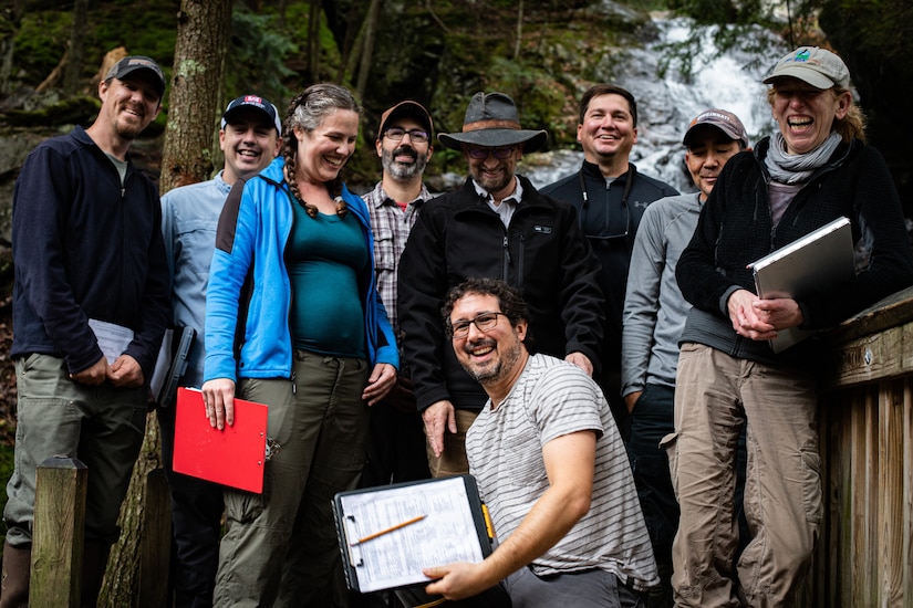 group of people pose for photo