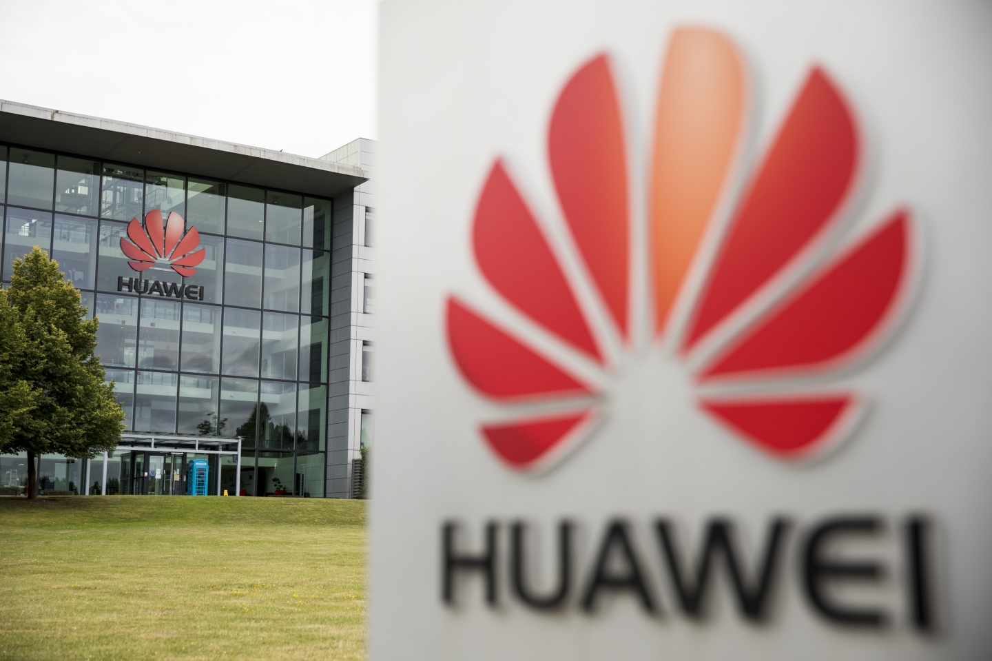 A Huawei Technologies Co. logo sits on a sign outside the company's offices in Reading, U.K., on Monday, July 13, 2020.