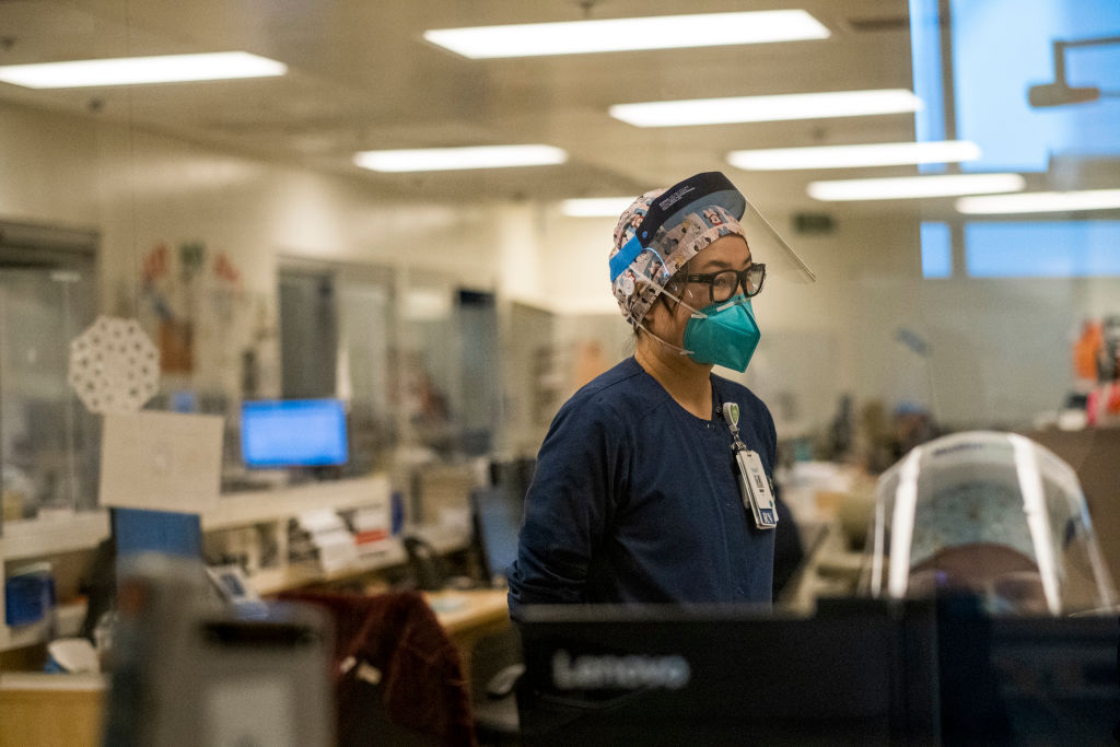 LOS ANGELES, CA - DECEMBER 31: Registered nurse Akiko Gordon is working in the ICU  at Martin Luther King Jr. Community Hospital (MLKCH) on Friday, Dec. 31, 2021 in Los Angeles, CA.  (Francine Orr / Los Angeles Times via Getty Images)