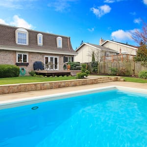 large house with  big pool in yard