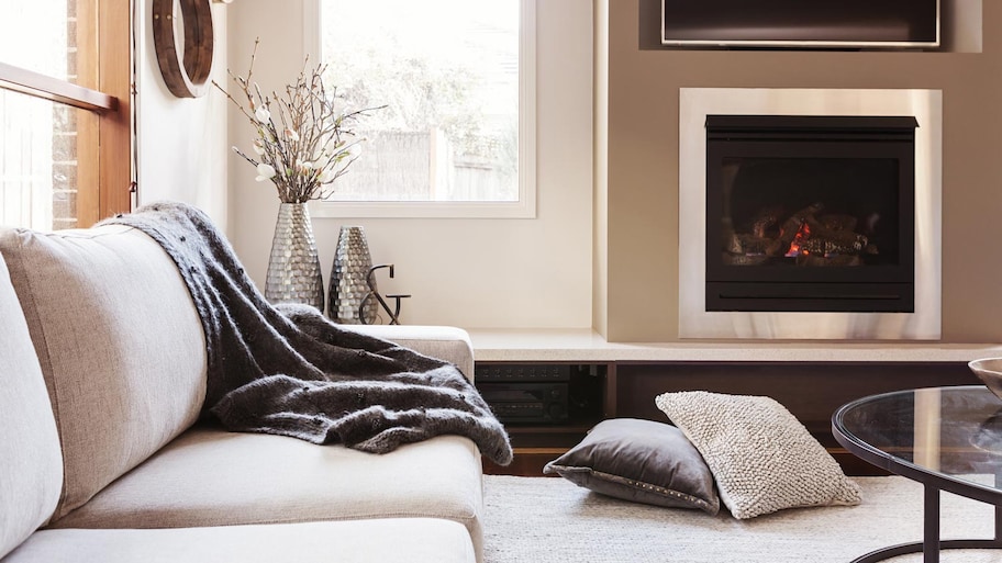 A cozy living room with a gas fireplace