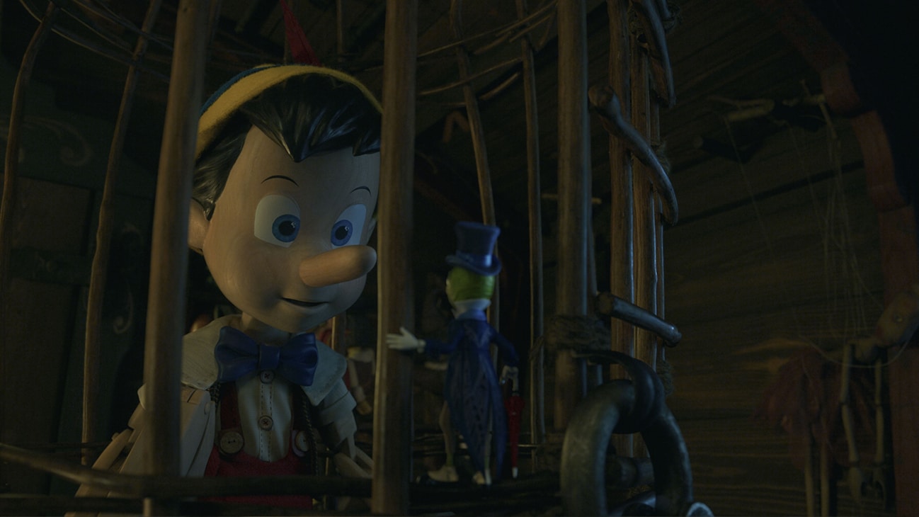 (L-R): Pinocchio (voiced by Benjamin Evan Ainsworth) and Jiminy Cricket (voiced by Joseph Gordon-Levitt) in Disney's live-action PINOCCHIO, exclusively on Disney+. Photo courtesy of Disney Enterprises, Inc. © 2022 Disney Enterprises, Inc. All Rights Reserved.