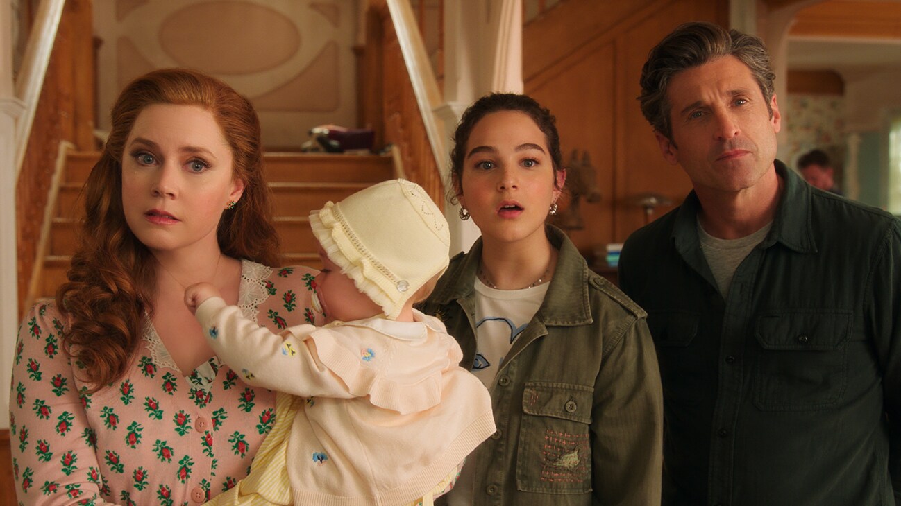 (L-R): Amy Adams as Giselle, Sofia (played by Mila & Lara Jackson), Gabriella Baldacchino as Morgan Philip, and Patrick Dempsey as Robert Philip in Disney's live-action DISENCHANTED, exclusively on Disney+. Courtesy of Disney Enterprises; Inc. © 2022 Disney Enterprises, Inc. All Rights Reserved.