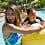 At the Waikolohe Stream, a couple and their son hold onto a raft