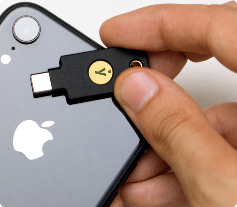 YubiKey 5C NFC next to iphone