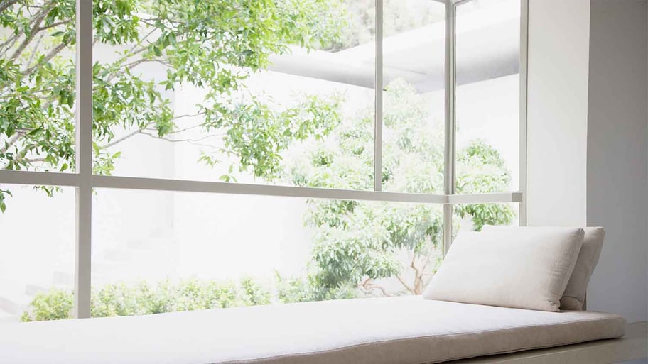 A view of a window seat in a box bay window