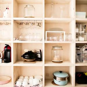 A wooden shelving unit in the living room