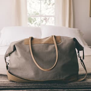 Duffle bag on bed