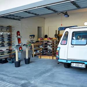 A garage with concrete floor and sandboards