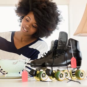 Woman putting price tags on items