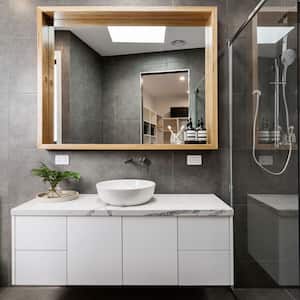 A modern bathroom with a floating vanity