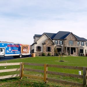 moving truck by house