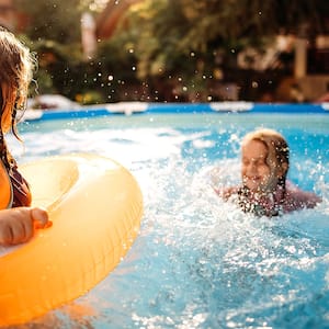 Kids swimming in the pool