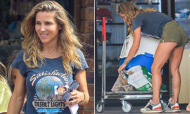 Elsa Pataky shows off her very toned legs and pert bottom in a pair of TINY shorts