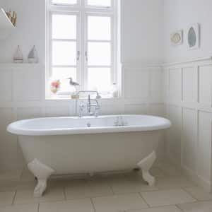 white freestanding bathtub in white bathroom