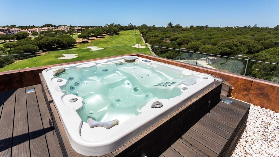 Vinyl hot tub on a patio roof