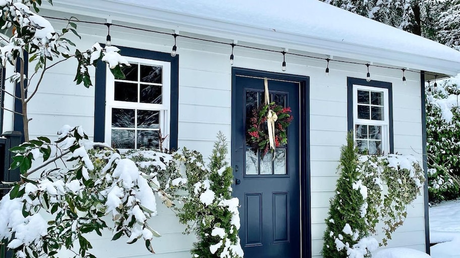 A garden shed with windows