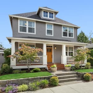 Exterior view of a house with concrete steps