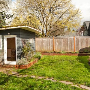 A cute garden shed in backyard