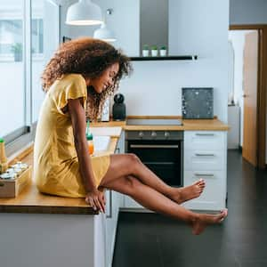 Woman smiling in kitchen