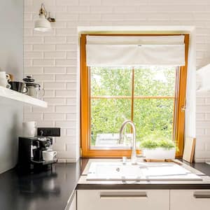 white kitchen with black countertop 