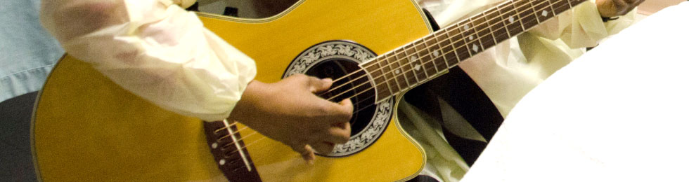 hand playing guitar