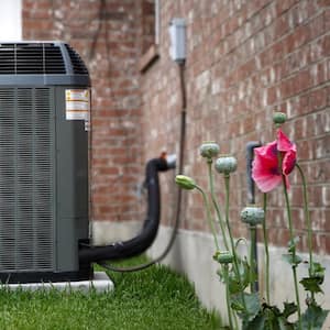 An AC on house backyard 