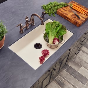 Dark Corian counter around kitchen sink