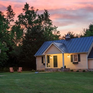 The exterior of a house at sunset