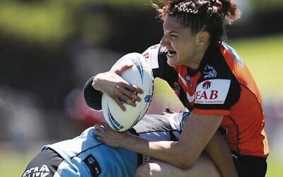 Ashleigh Werner on the charge for the Wests Tigers versus the Cronulla Sharks last Saturday. 
Photo: PureLight Photography