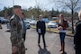 U.S. Army Corps of Engineers, Europe District Regional Program Manager for Air Force Military Design and Construction Program Jennifer Regel, right, discusses the construction of the new Family Housing Management Facility in Vogelweh, Germany April 11, 2022 with project partners, including the then 86th Air Lift Wing Commander U.S. Air Force Brig. Gen. Joshua Olson, left, just before its formal groundbreaking ceremony. The project is an example of one of the many traditional military construction projects Europe District delivers in support of U.S. Air Forces Europe at installations across the continent. (U.S. Army photo by Alfredo Barraza)