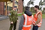 Estonian Air Force Capt. Kaur Käämer discusses U.S. and Estonian partnership and European Deterrence Initiative construction with U.S. Army Corps of Engineers, Europe District Quality Assurance Engineer Jüri Saljukov and Project Engineer Chris Bailey at Amari Air Base in Estonia May 12, 2022. Over the past several years, the U.S. Army Corps of Engineers has delivered various projects in Estonia and neighboring Baltic countries Latvia and Lithuania through the European Initiative (EDI). Under the EDI program military infrastructure is built to enhance the U.S. deterrence posture, increase the readiness and responsiveness of U.S. forces in Europe, support the collective defense and security of NATO allies, and bolster the security and capacity of U.S. allies and partners. (U.S. Army photo by Chris Gardner)