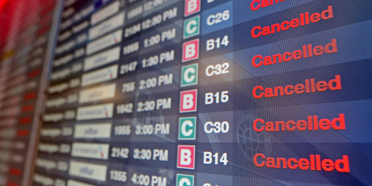 BOSTON, MA - February 4:    Canceled flights, plane de-icing and runway clearing at Logan Int. Airport on February 4, 2022 in BOSTON, Massachusetts.  (Staff Photo By Stuart Cahill/Boston Herald)